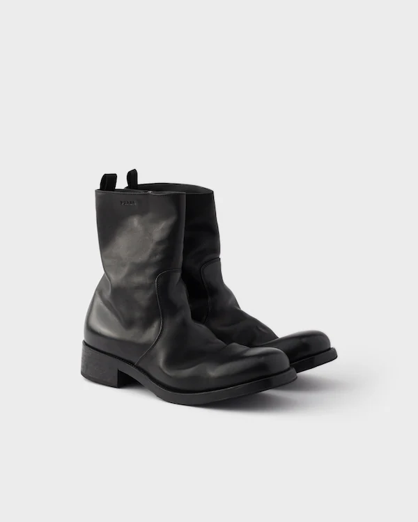 Lederreißverschlussstiefel